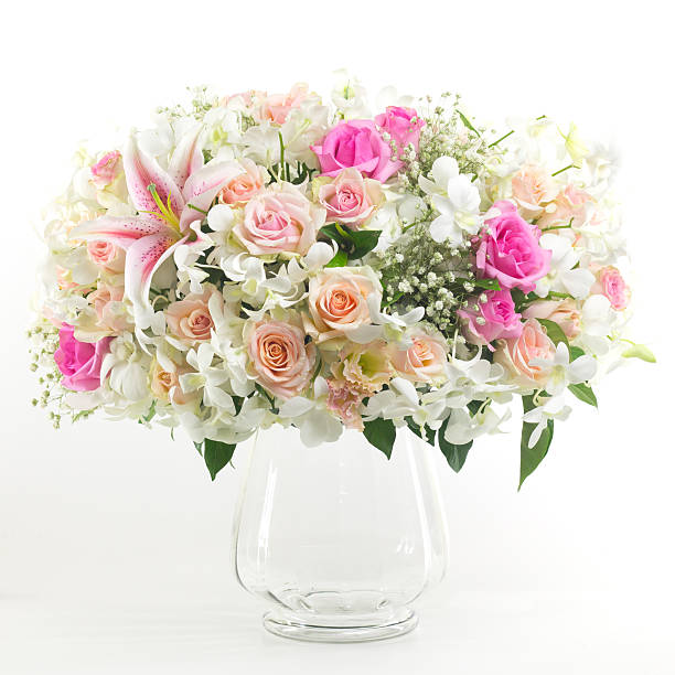 istock Flowers in vase isolated. 486563218