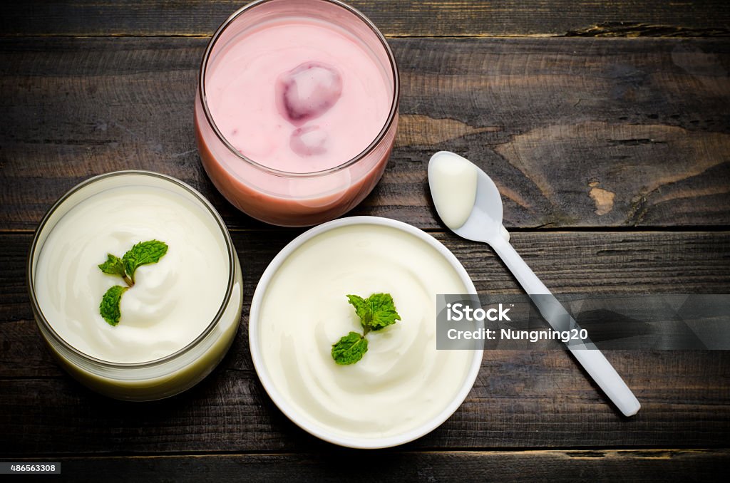 Yogurt Homemade yogurt in the glass on wooden background,healthy food Probiotic Stock Photo