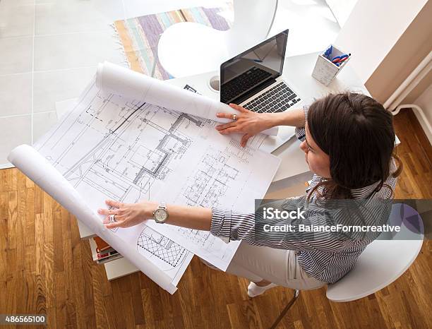 Female Architect Stock Photo - Download Image Now - Architecture, Architect, Plan - Document