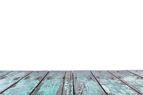 istock Empty top of wooden table or counter isolated on white 486567032