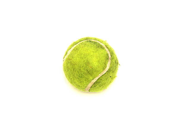 istock Dirty bright tennis ball on white background 486568168