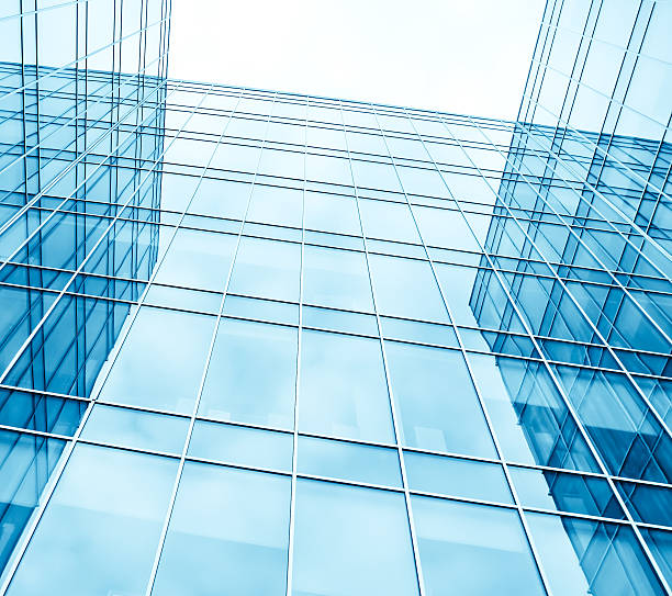 istock modern blue glass wall of skyscrapers 486568173