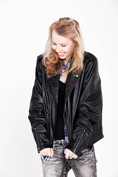 istock Girl in leather is smiling 486568435