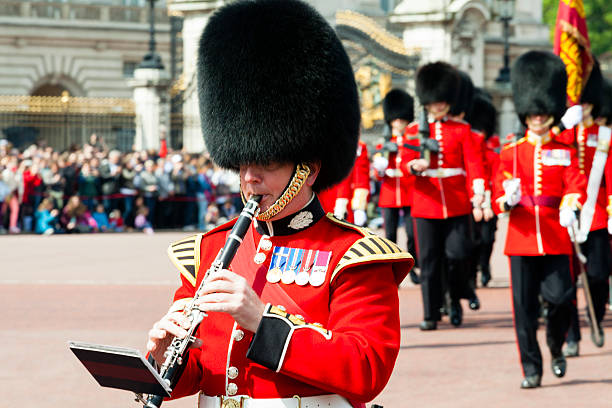 London, United Kingdom - June 21, 2016: The marching Coldstream Guard Band during the Changing of the Guards ceremony at Buckingham Palace early in the day.