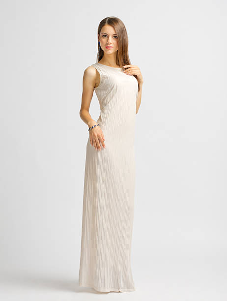 istock Young woman in long dress 486569962