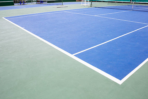 istock blue and green tennis court surface 486570370