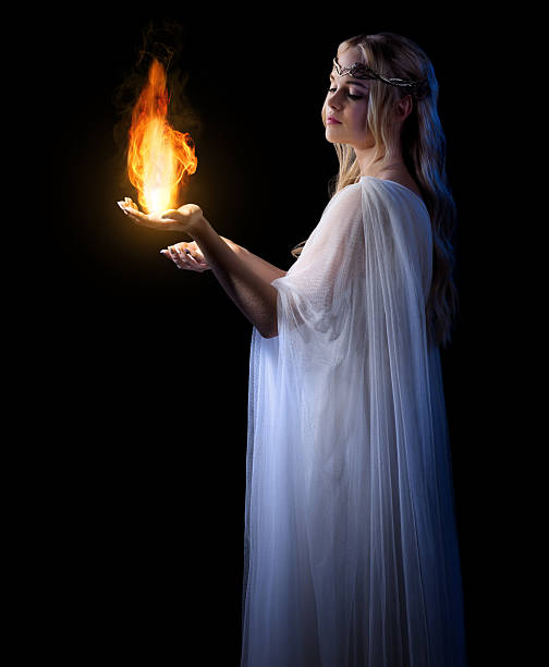 istock Young elven girl with fire isolated 486571610