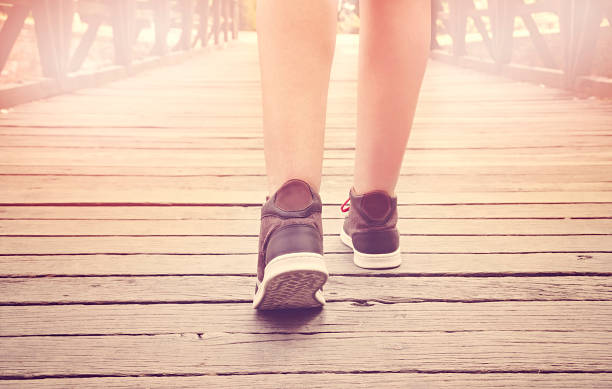 istock Walking in sport shoes 486571716