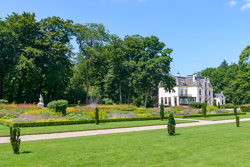 Staverden, The Netherlands - July 16, 2015: Formal garden of the Staverden castle in Gelderland, The Netherlands. 