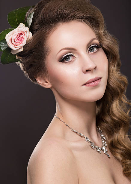 istock beautiful woman with flowers on her head 486574077