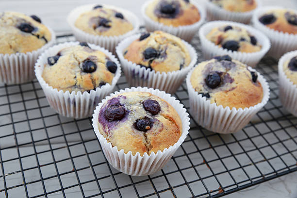 istock Homemade wholemeal coconut blueberry muffins 486574880