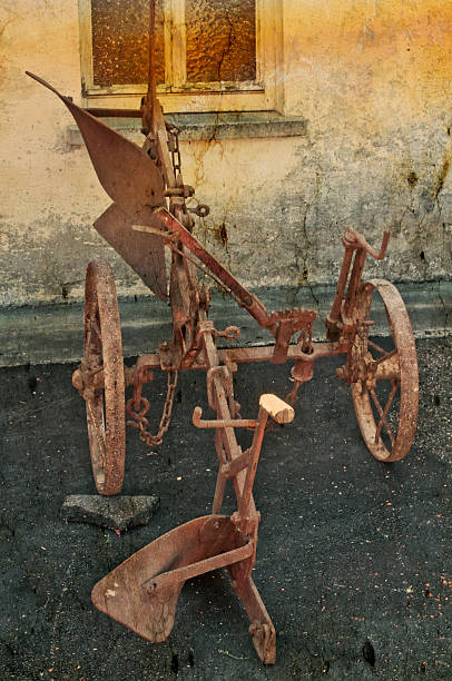 istock antique agriculture machine plough 486575724