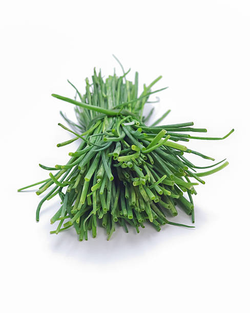 istock Bunch of fresh chives isolated 486578440