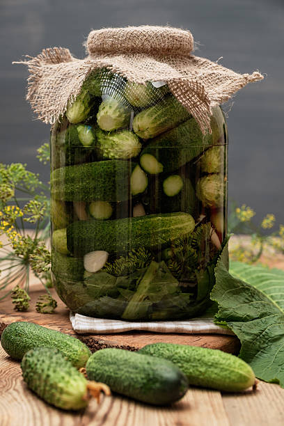 istock Homemade cucumber preserved in glass jar. 486579942