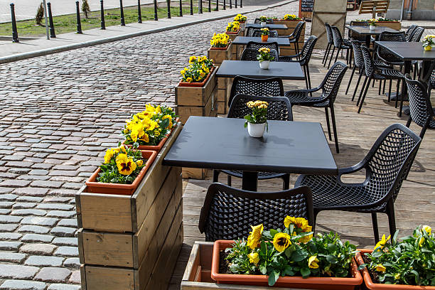 istock Cafe View with Black Tables and Chairs 486592180
