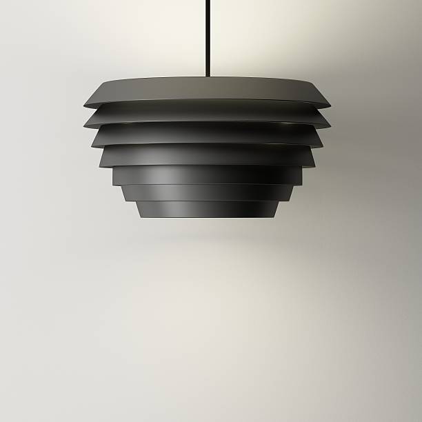 istock Black Lamp of decorated design and wall background 486592498