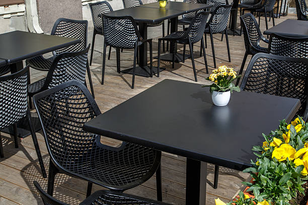 istock Cafe View with Black Tables and Chairs 486593028
