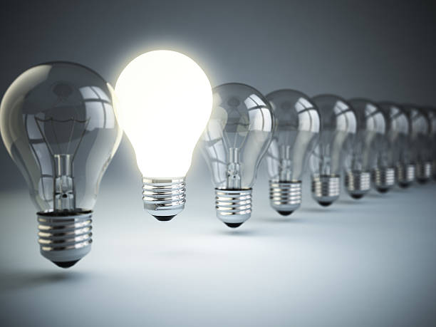 istock Idea or uniqueness, originality concept. Row of light bulbs with 486595860