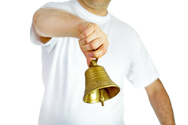 Man ringing bell stock photo