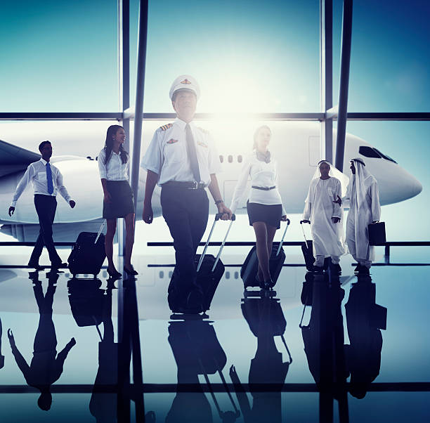 istock Airport Pilot Cabin Crew Professional Occupation Concept 486596818