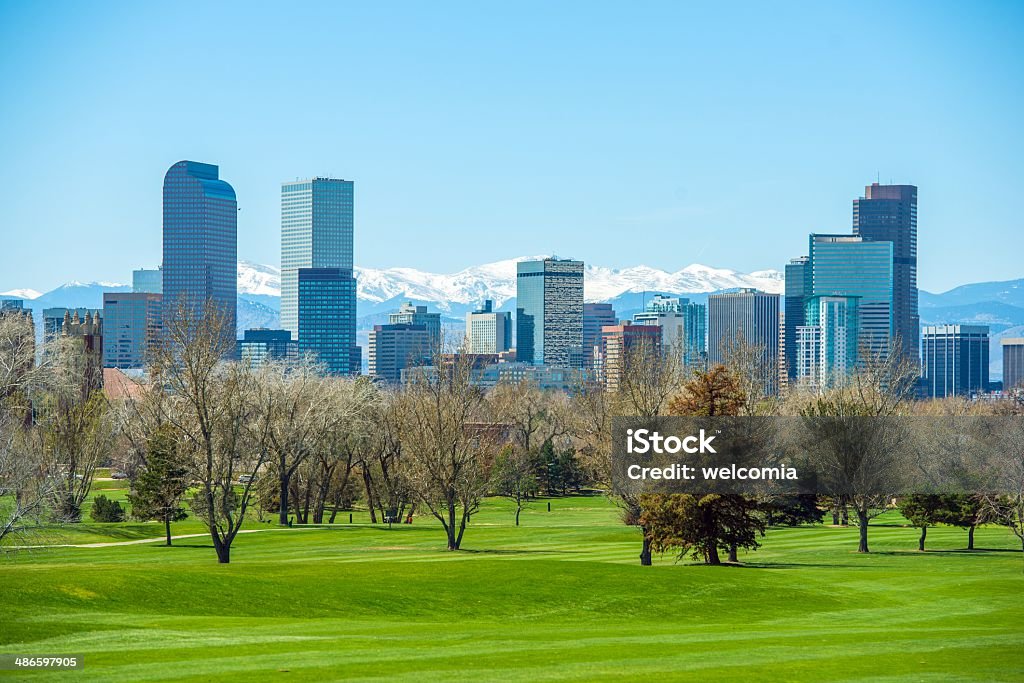 Sunny Denver Skyline Sunny Denver Skyline. Spring in Colorado. Denver Skyline and Snowy Rocky Mountains. Denver Stock Photo