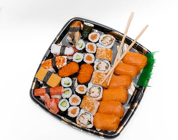 istock Close up view of fresh cooked sushi on white background 486598325