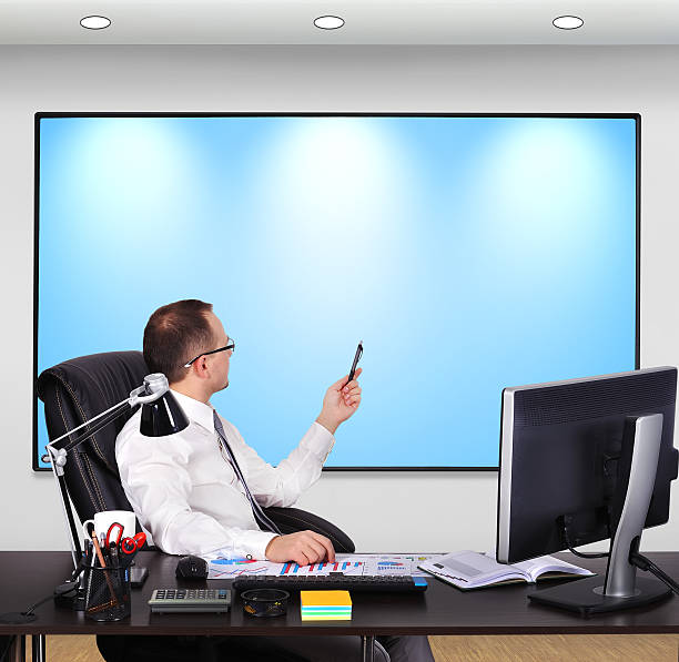 istock businessman sitting in office 486599173