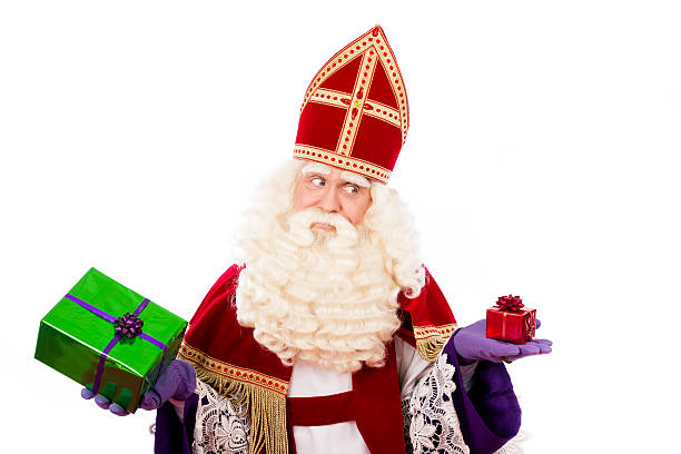 istock Sinterklaas showing  gifts 486599390
