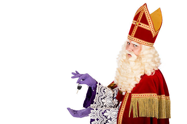 istock Sinterklaas holding car key on white background 486600758