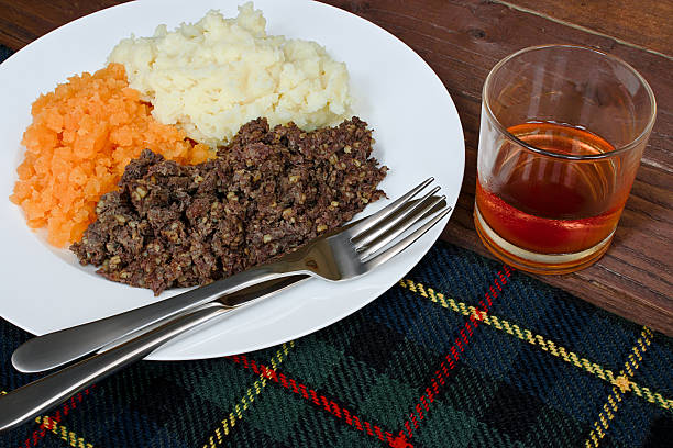 Haggis neeps and tatties Traditional Scottish haggis, neeps and tatties with whisky also known as a burns supper. haggis stock pictures, royalty-free photos & images