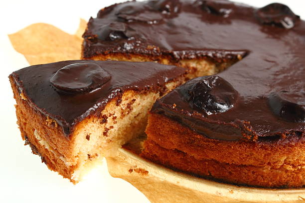 istock Chocolate Topped Sponge Cake with Prunes and Toffee Sauce 486601759