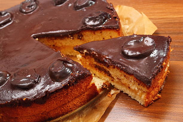 istock Chocolate Topped Sponge Cake with Prunes and Toffee Sauce 486601767