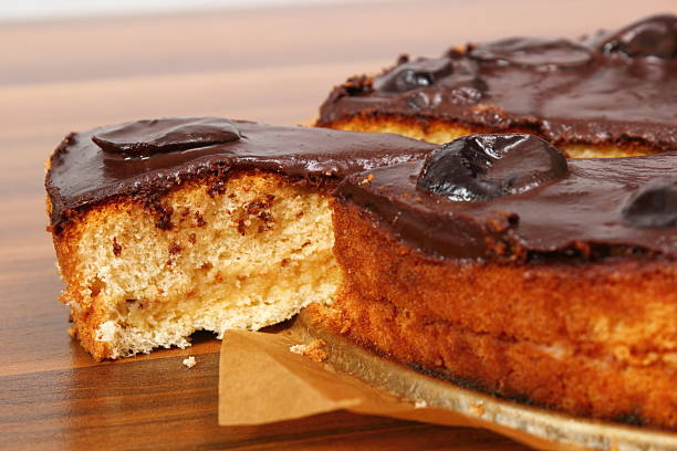 istock Chocolate Topped Sponge Cake with Prunes and Toffee Sauce 486601771