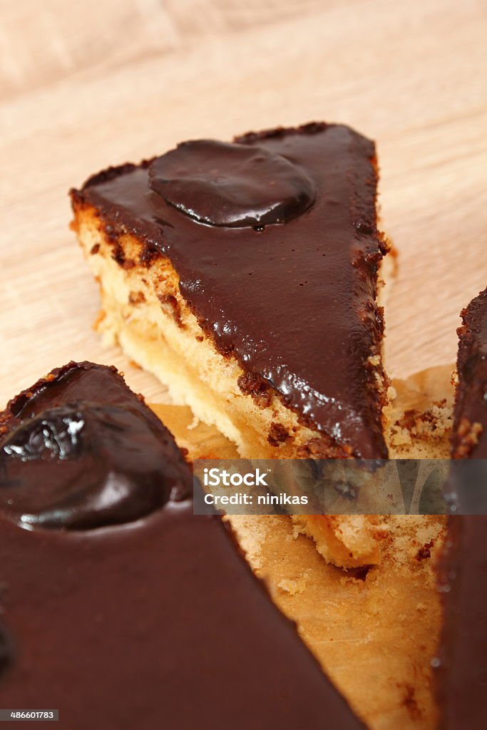 Chocolate Topped Sponge Cake with Prunes and Toffee Sauce Baked Stock Photo