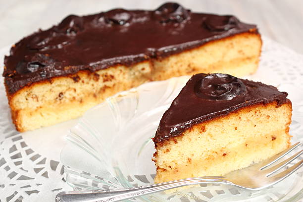 istock Chocolate Topped Sponge Cake with Prunes and Toffee Sauce 486601789