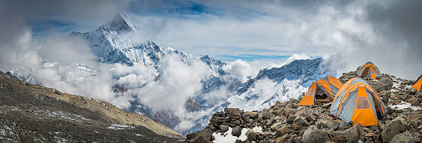 istock Base camp tents high mountain wilderness panorama Annapurna Himalayas Nepal 486602229