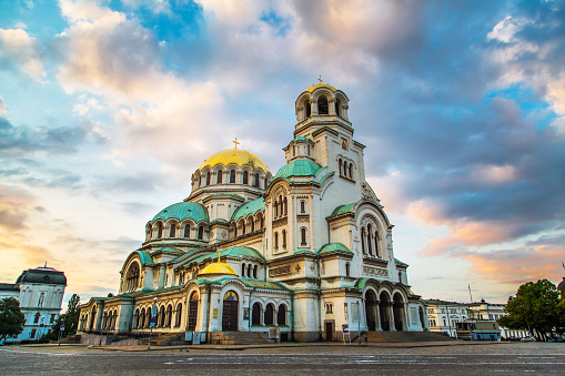 A stunning shot of the Alexander Nevsky Cathedral, one of Sofia's most iconic landmarks, displaying its neo-Byzantine architecture, golden domes, and intricate details, standing as a testament to Bulgaria's rich history and religious heritage.