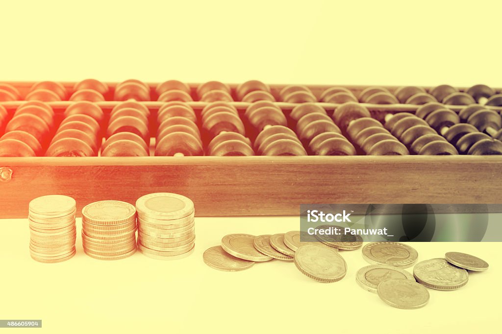 Vintage style - Wooden abacus beads and Thai baht Coins 2015 Stock Photo