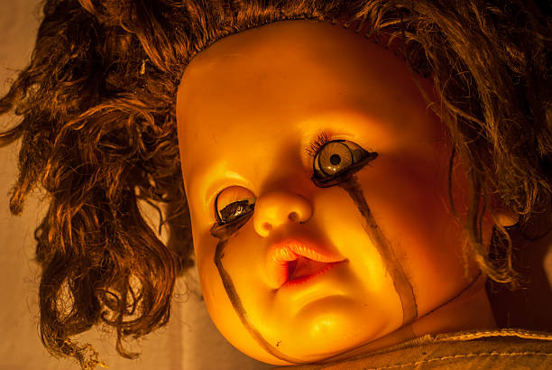 istock Close up of scary doll 486606540