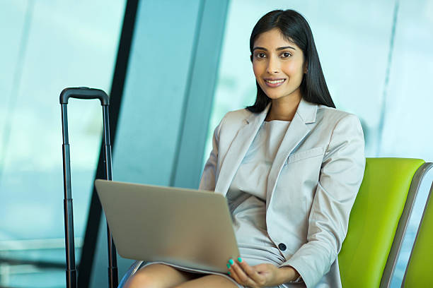 istock young indian businesswoman with laptop computer 486608142