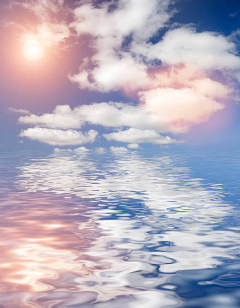 beautiful clouds above ocean background stock photo