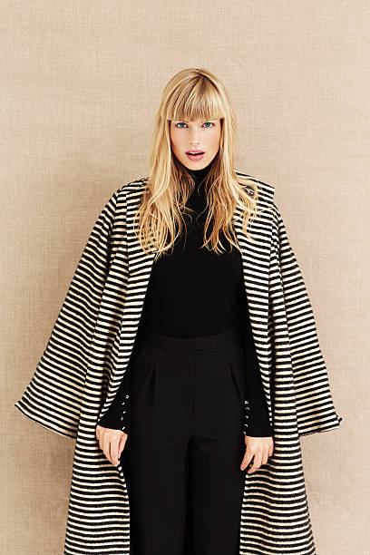 istock Portrait of model in coat 486611914