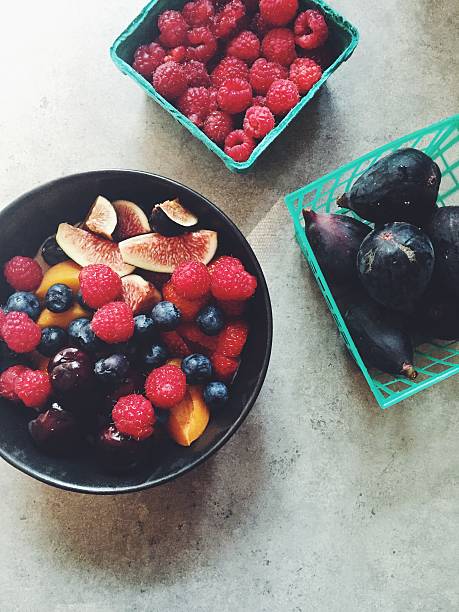 istock Fresh fruit and berries: raspberries, figs, blueberries, cherries, apricots 486613066