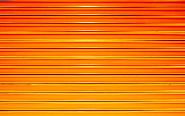 istock Orange paint corrugated metal background 486613190