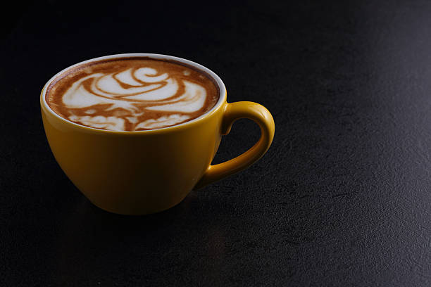 istock Cup of cappuccino on dark background 486614004