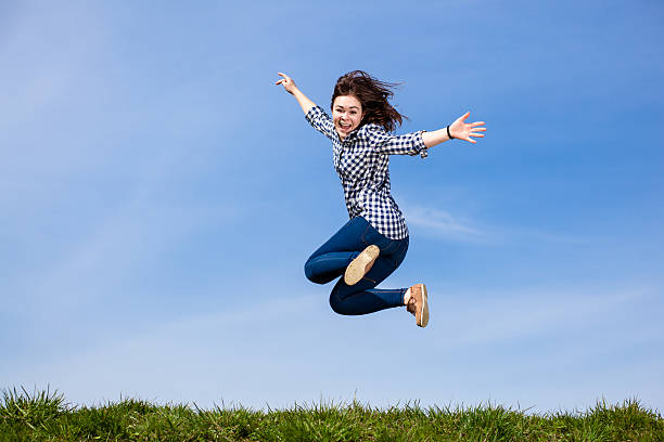 istock Young woman jumping 486615750