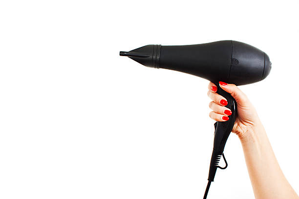 asciugacapelli a disposizione - hair dryer single object plastic black foto e immagini stock