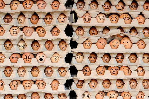 Faces on the eggs. Difference faces living together - Diversity concept