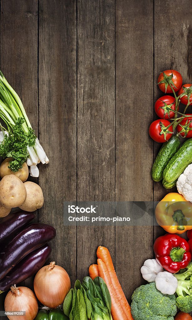 Vegetables on wood background with space for text. Organic food. Vegetables on old wood texture background with space for text. Organic food. Autumn Stock Photo