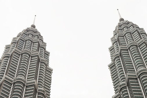 View of The Petronas Twin Towers, in Kuala Lumpur, Malaysia. Petronas are the tallest twin buildings in the world (451.9 m)